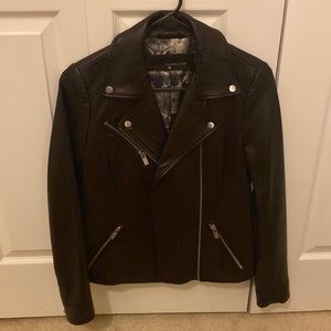 Brand new, never worn, Wilson’s Leather ladies biker jacket.  100 % leather.